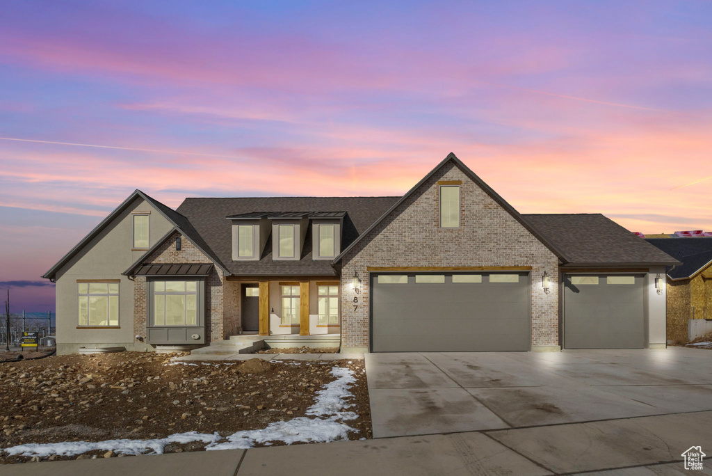 View of front of home with a garage