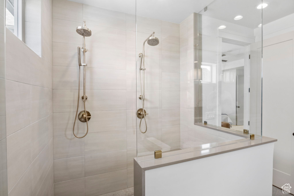 Bathroom with tiled shower