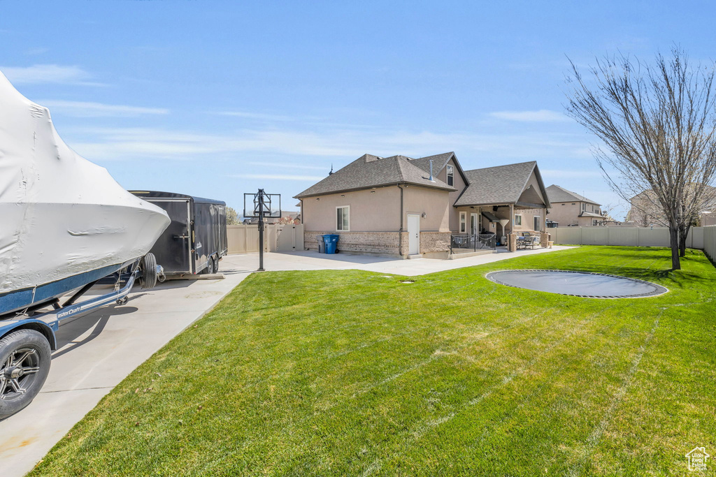 View of yard with a patio