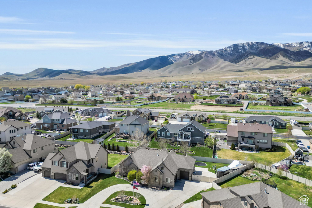 Birds eye view of property with a mountain view