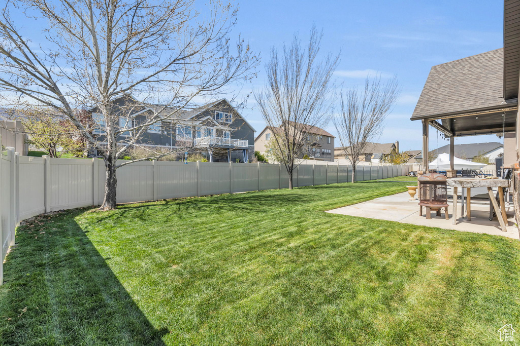 View of yard featuring a patio