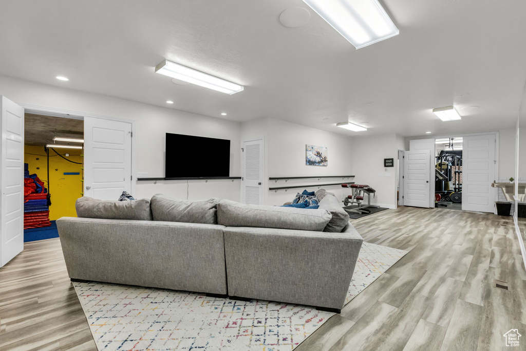 Living room with light wood-type flooring