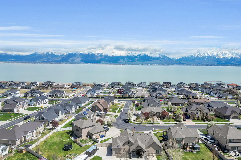 Aerial view featuring a water and mountain view