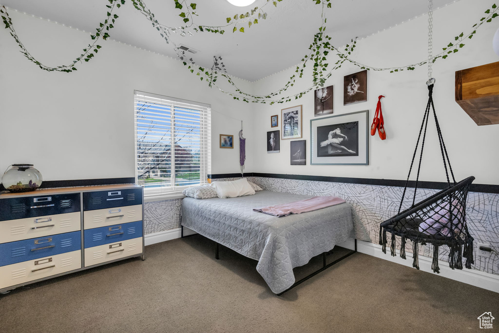 Bedroom featuring carpet floors