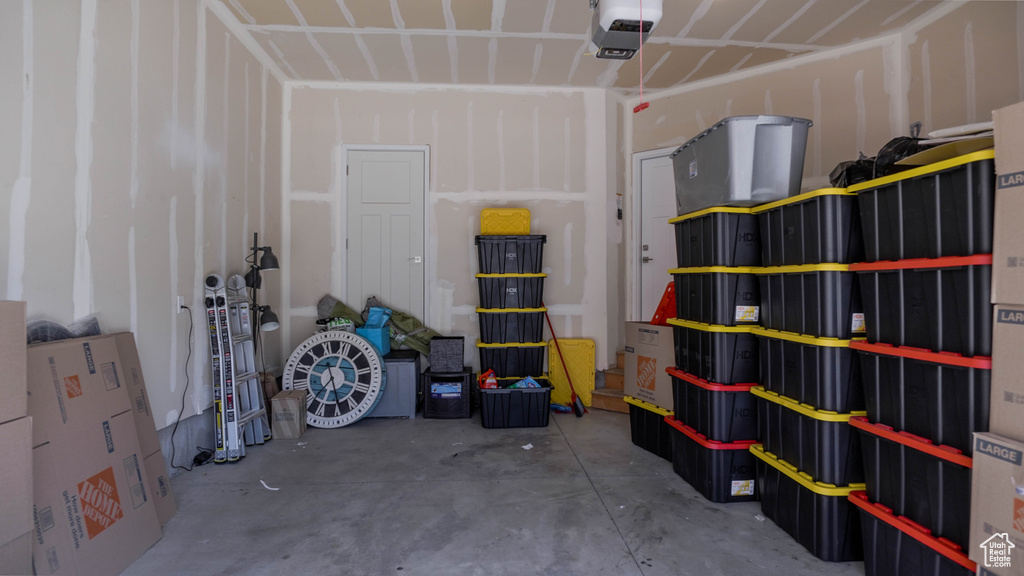 Garage featuring a garage door opener