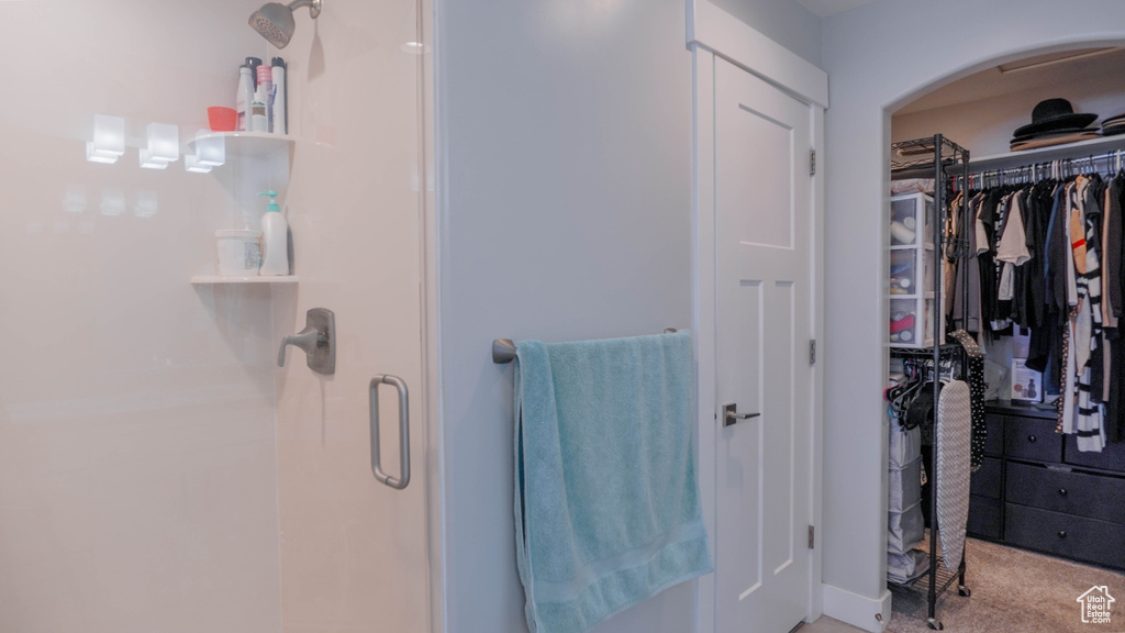 Bathroom with an enclosed shower