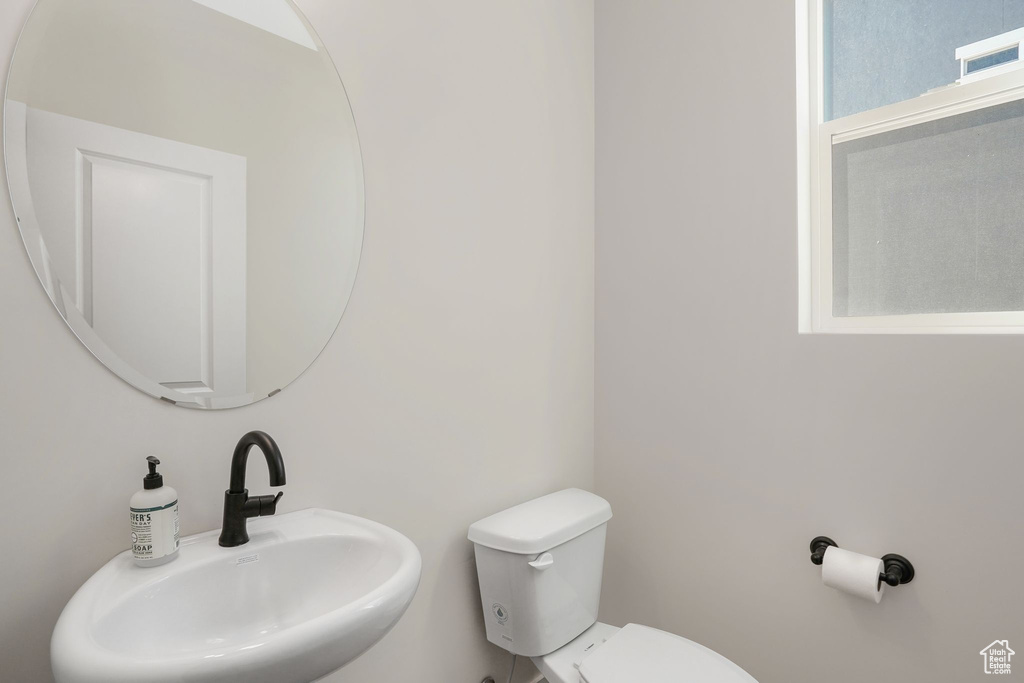 Bathroom with toilet and sink