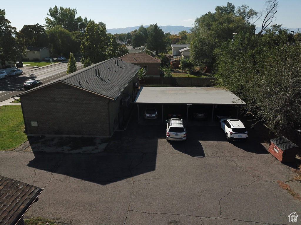 Birds eye view of property with a mountain view