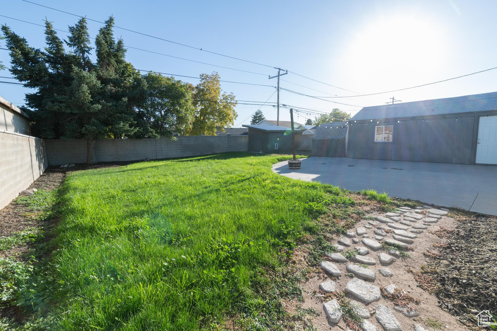 View of yard with a patio