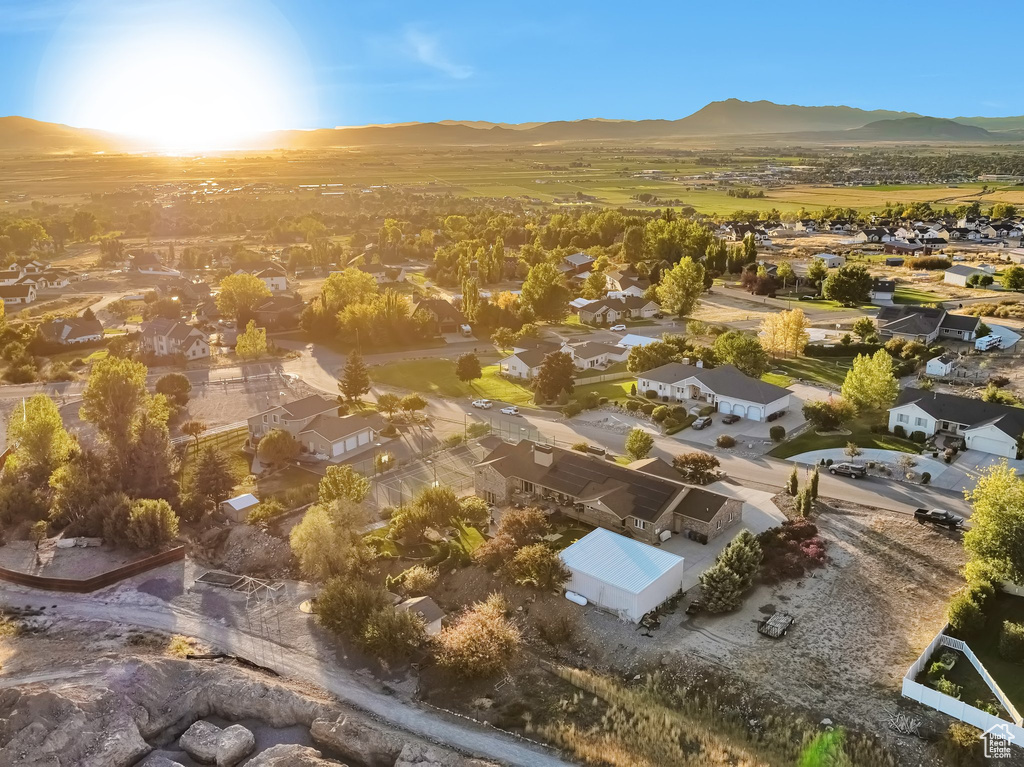 Birds eye view of property with a mountain view