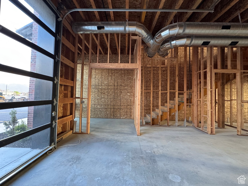 Misc room with unfinished concrete floors