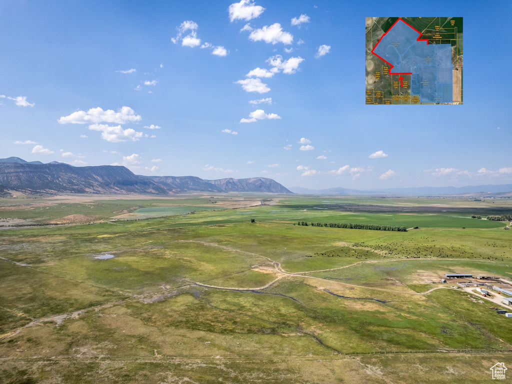 Property view of mountains featuring a rural view