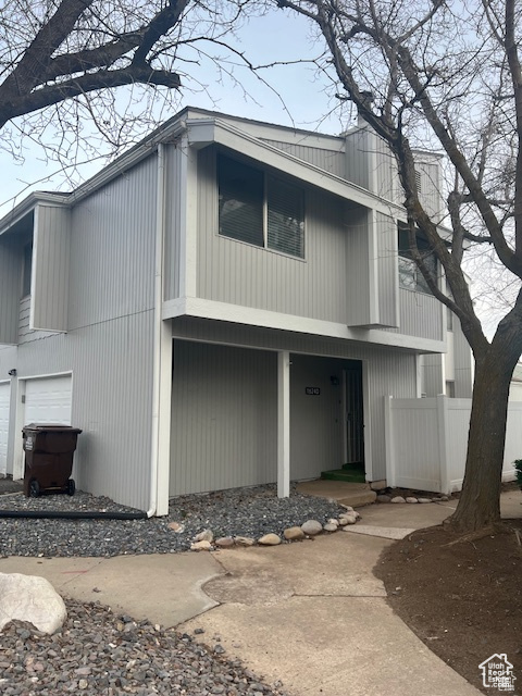 View of front of property featuring a garage