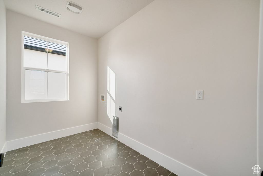 View of tiled spare room