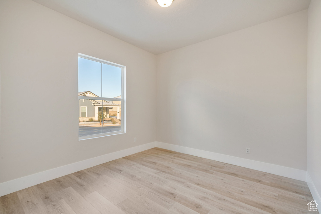 Spare room with light hardwood / wood-style floors