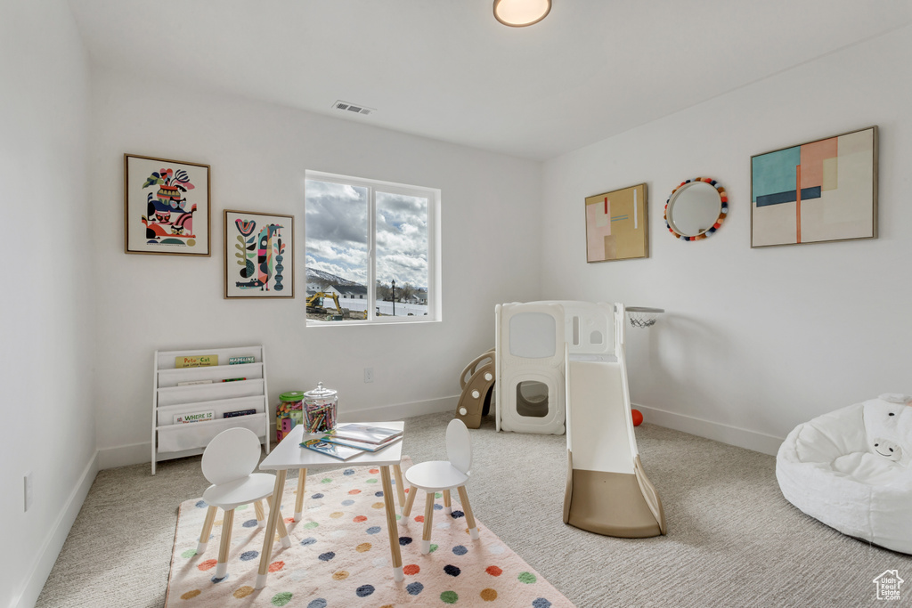 View of carpeted bedroom