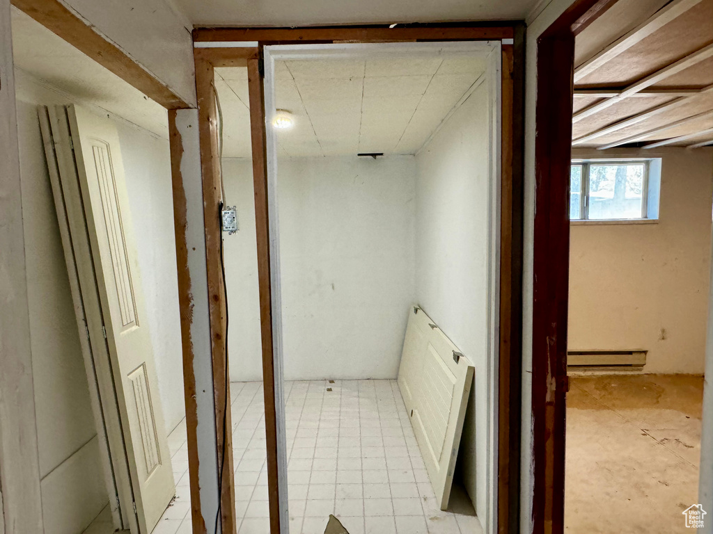 Hallway featuring a baseboard radiator