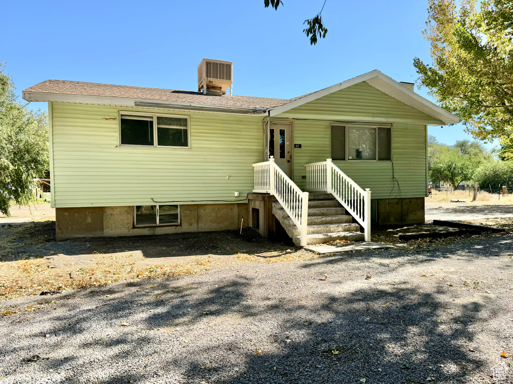 View of front of property with central AC