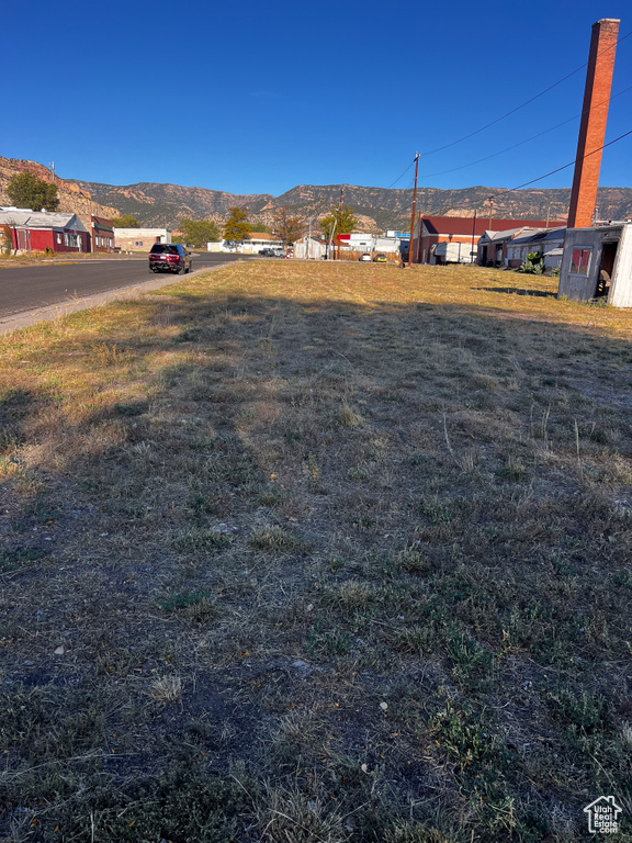 View of yard with a mountain view