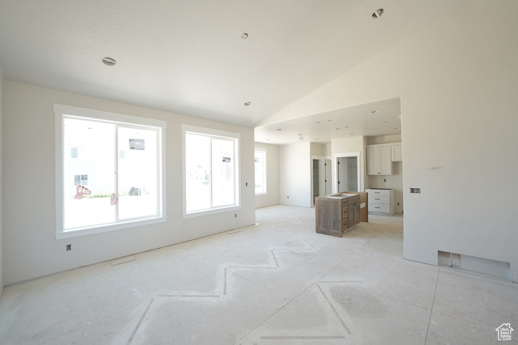 Interior space featuring lofted ceiling