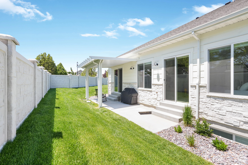 View of yard featuring a patio