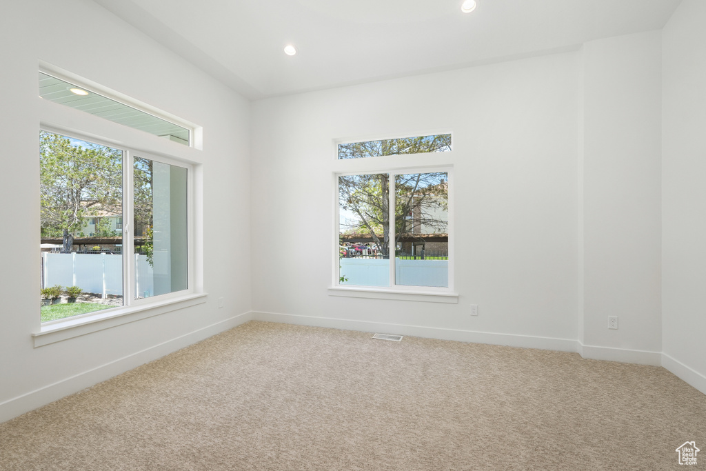 View of carpeted spare room