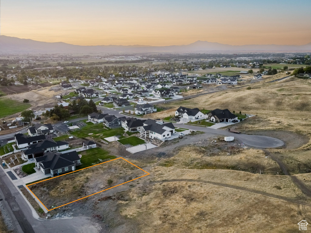 Aerial view at dusk with a mountain view