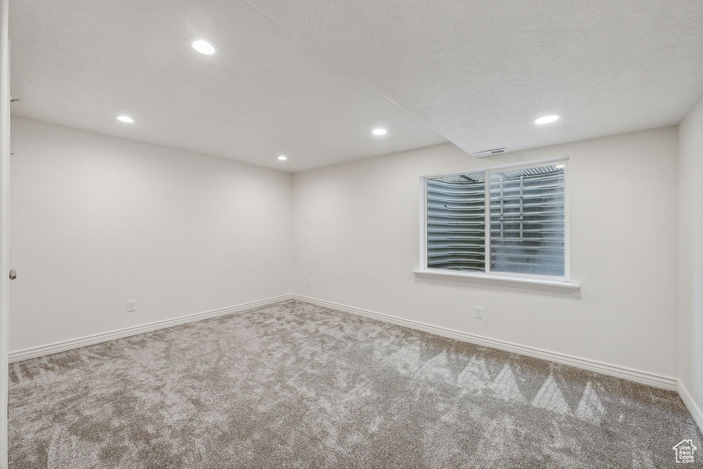 View of carpeted spare room