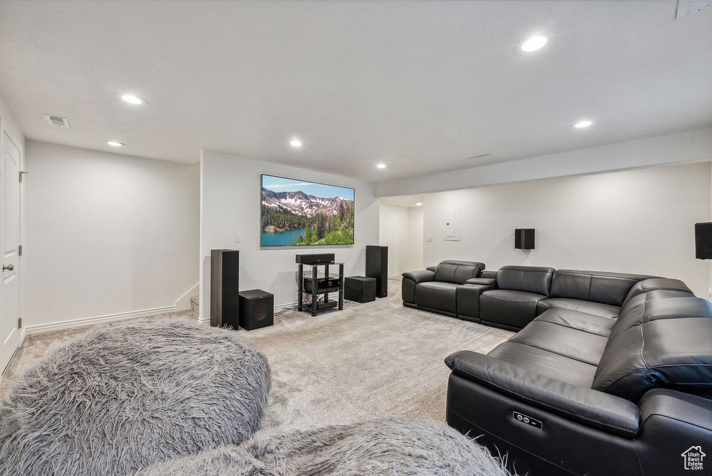 Living room featuring light carpet