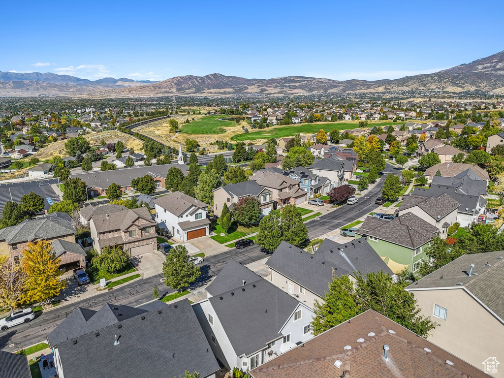 Birds eye view of property featuring a mountain view