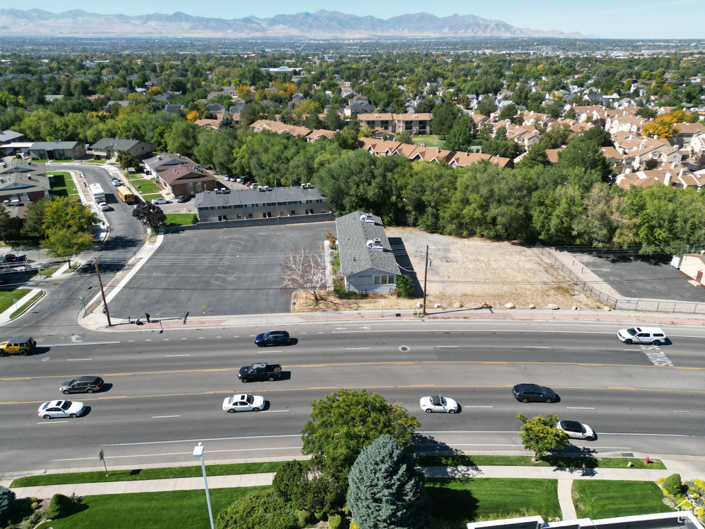 Birds eye view of property with a mountain view