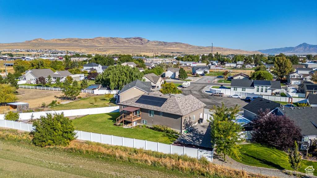 Birds eye view of property with a mountain view