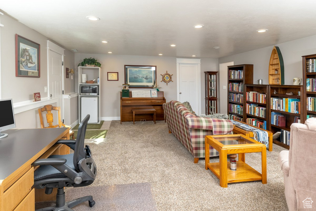 Living room featuring light colored carpet