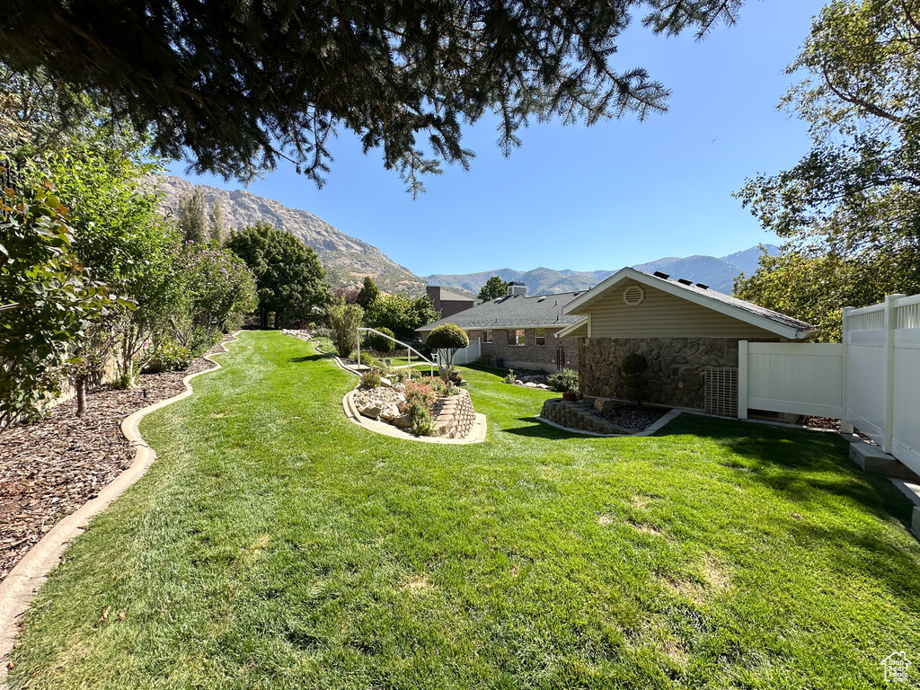 View of yard featuring a mountain view