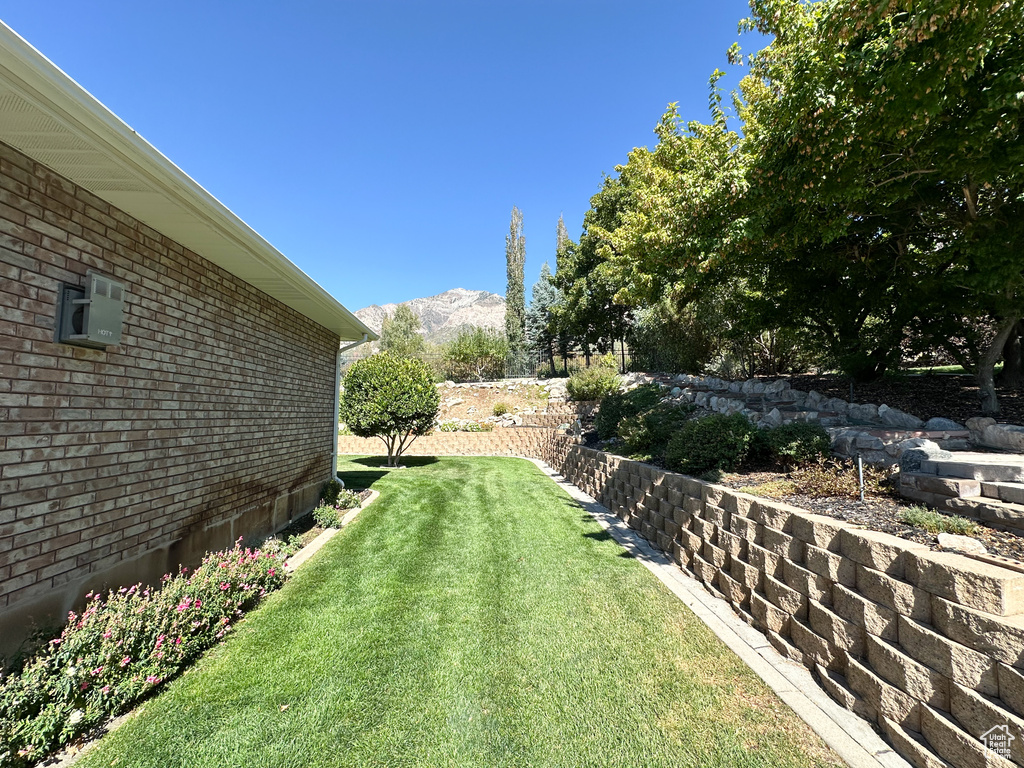 View of yard with a mountain view