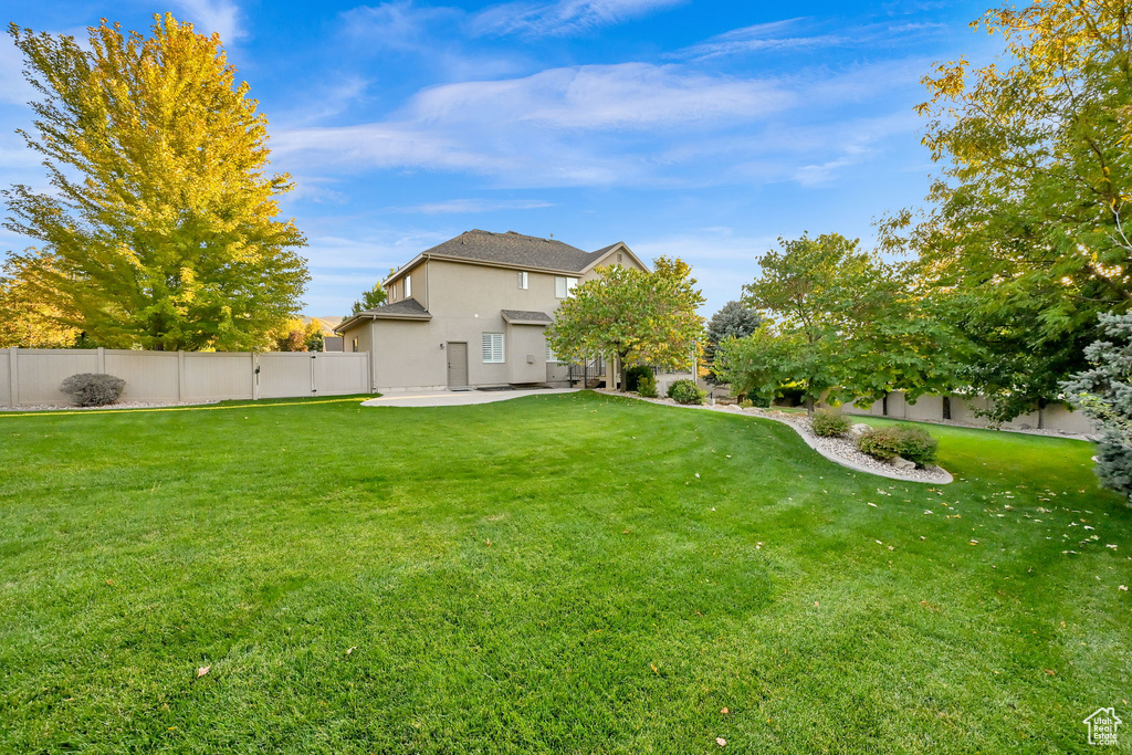 View of yard with a patio