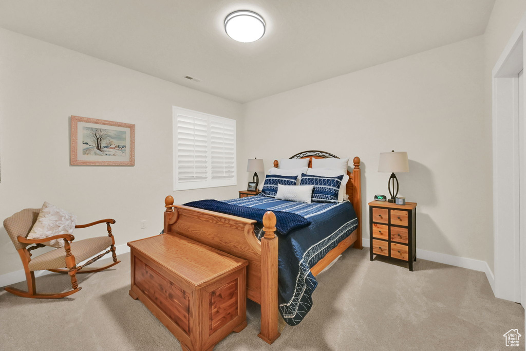 Bedroom with carpet flooring