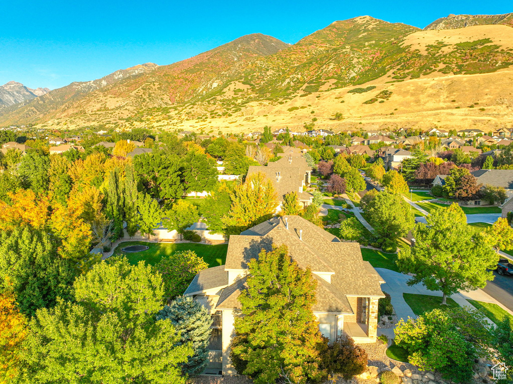 Birds eye view of property with a mountain view