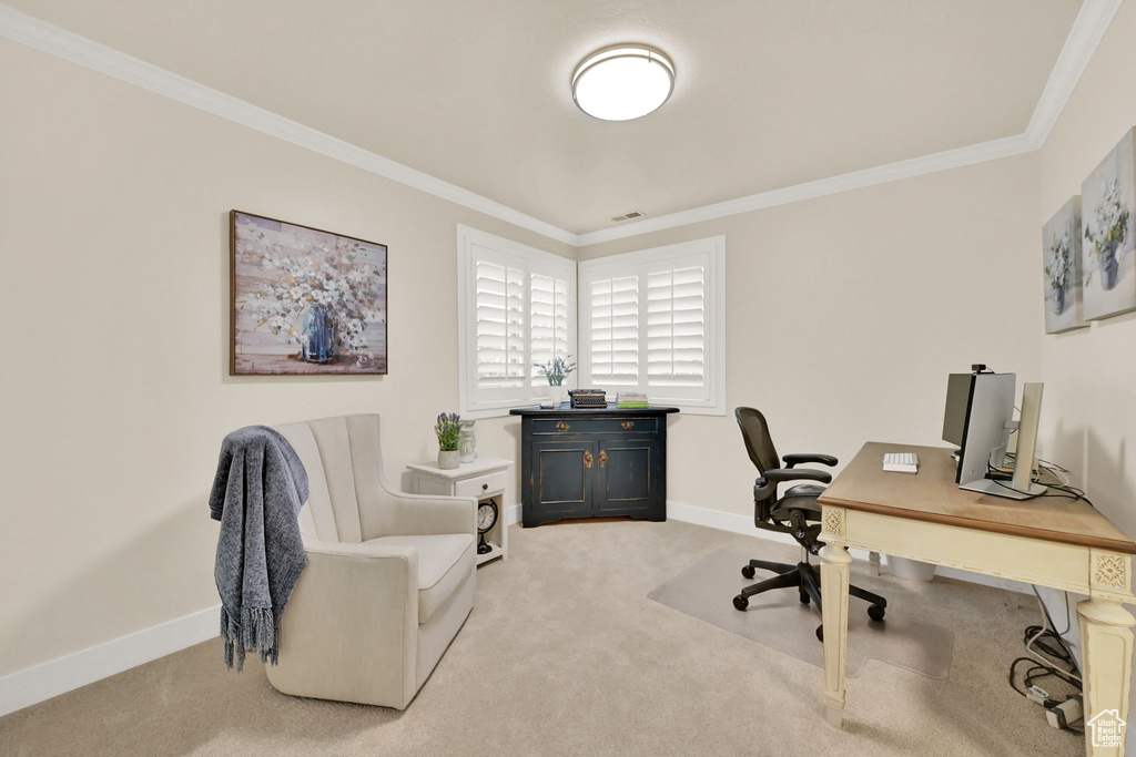 Office featuring light carpet and ornamental molding