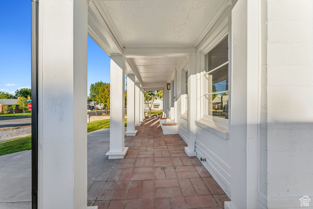 View of patio featuring covered porch