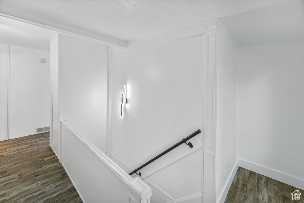 Staircase with wood-type flooring