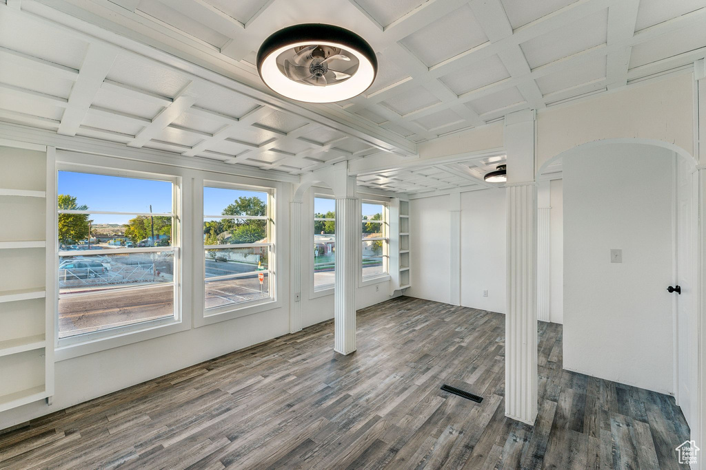 Interior space featuring coffered ceiling