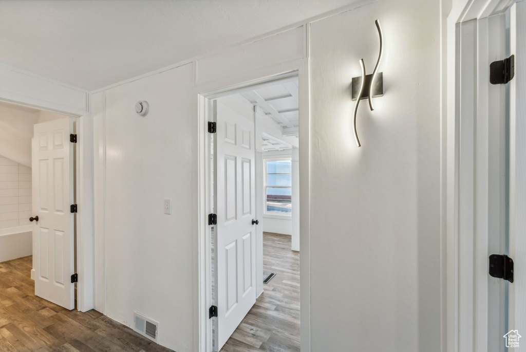 Hallway featuring hardwood / wood-style flooring