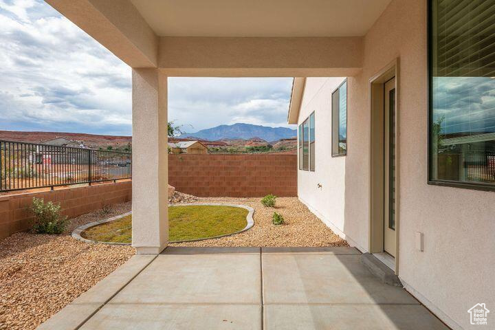 View of patio / terrace featuring a mountain view