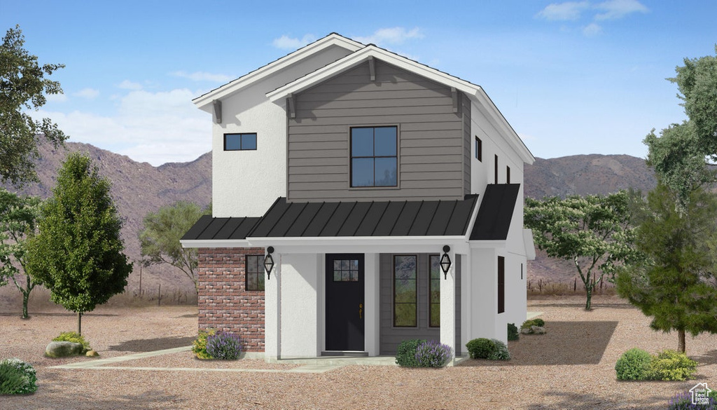 View of front of home with a mountain view