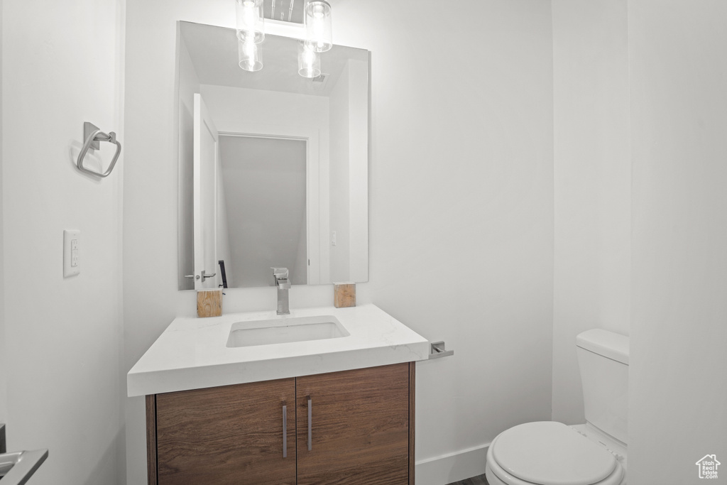 Bathroom with vanity and toilet