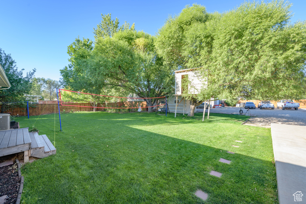 View of yard featuring central air condition unit