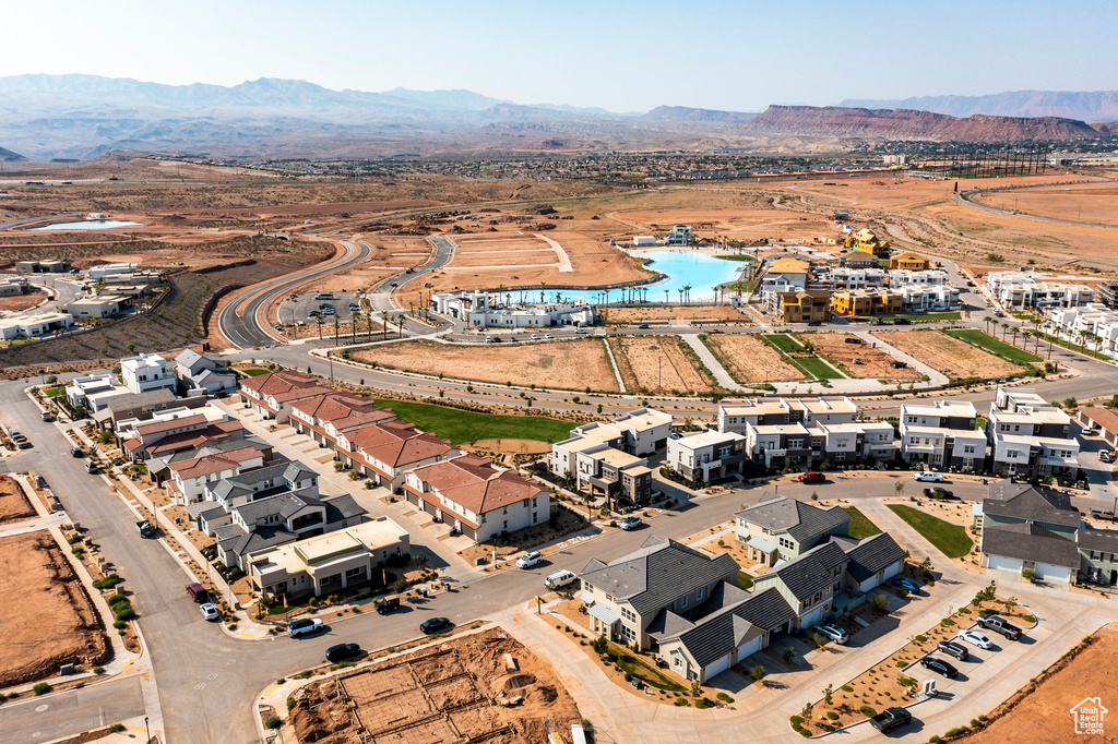 Birds eye view of property with a mountain view