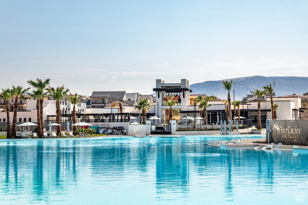 View of pool with a mountain view