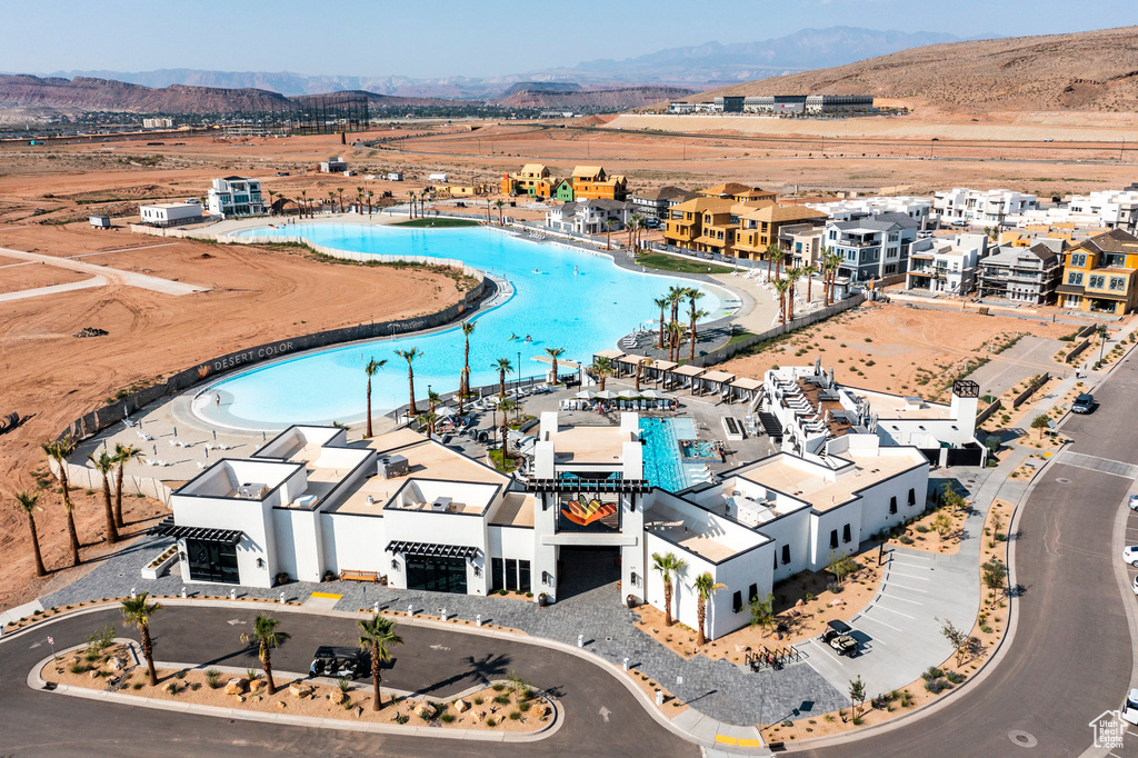 Birds eye view of property with a mountain view